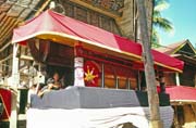 At funeral ceremony. Traditional house tongkonan with cofin. Tana Toraj area. Sulawesi, Indonesia.