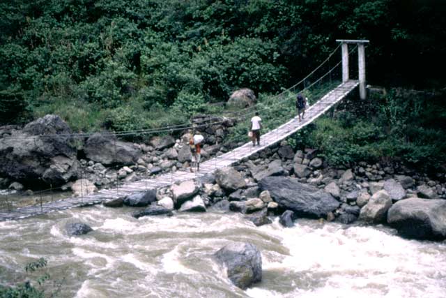 Crossing Baliem river using goverment bridge near Wamerek village. Papua,  Indonesia.