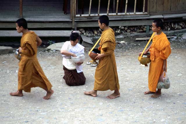 Morning offering. Pakbeng village. Laos.