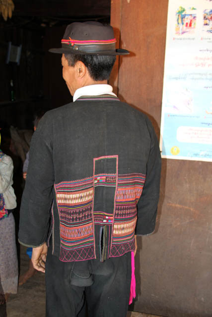 Akha man at traditonal clothes, area around Kengtung town. Traditionaly clothes are embroidered very much. Myanmar (Burma).